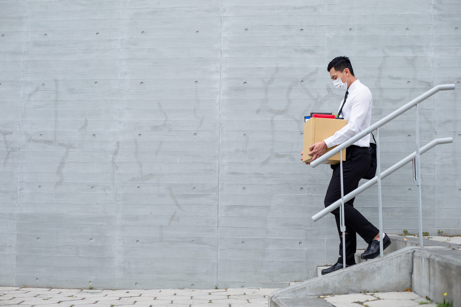 Man being fired because of COVID-19 economic implications
